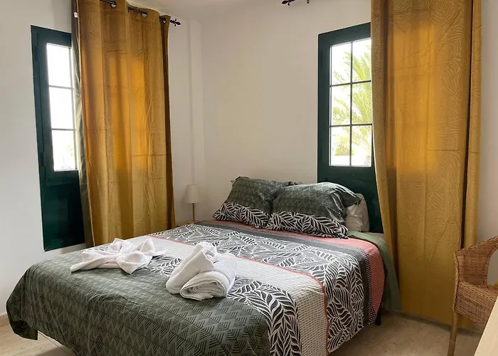 Vivilanza Surfhouse كوستا تاغيسي